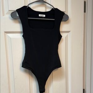 Elegant Black Bodysuit with Classic Design